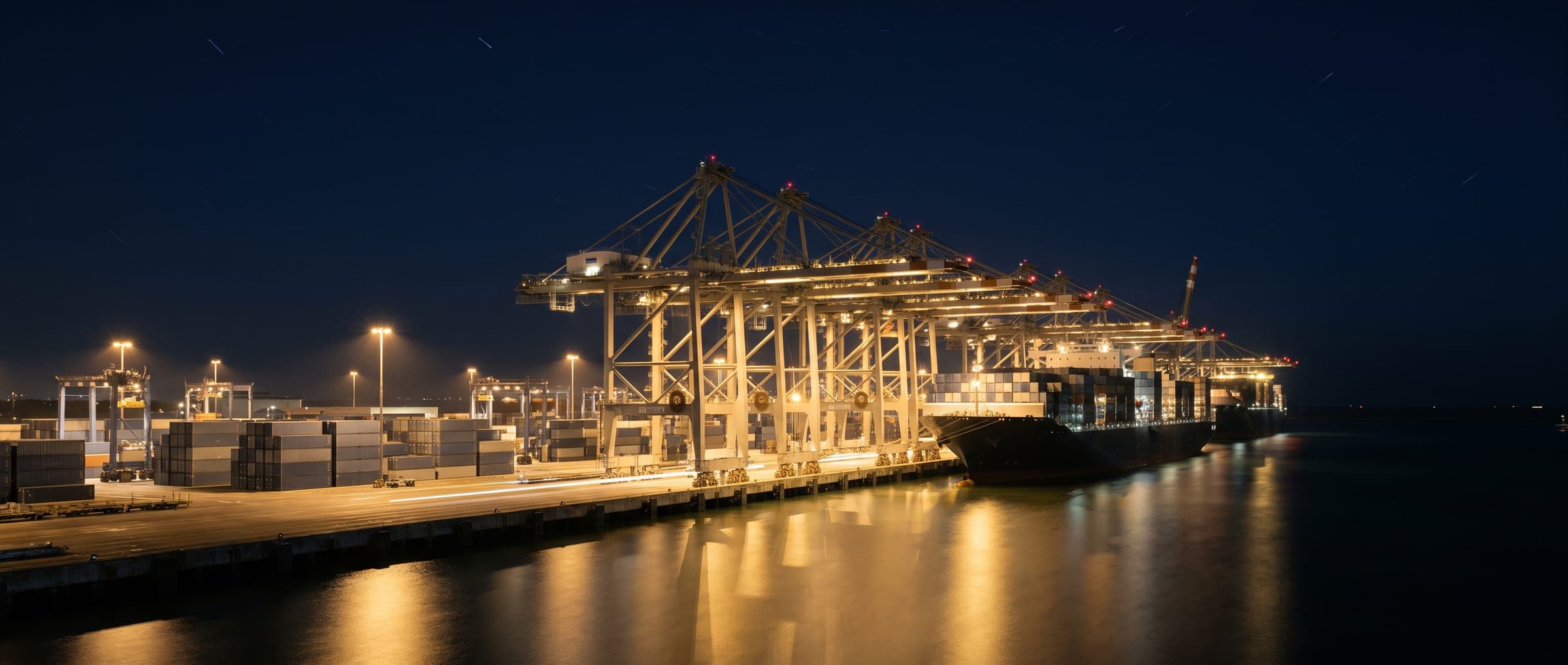 Container terminal gantry cranes at night
